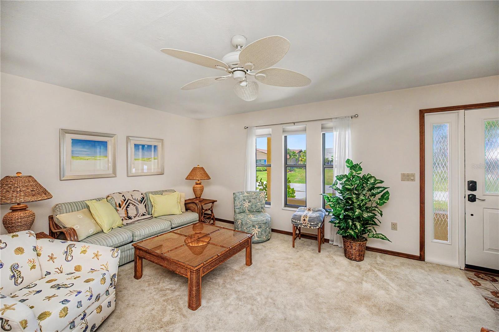 Inviting Front Living Room with Natural Light.