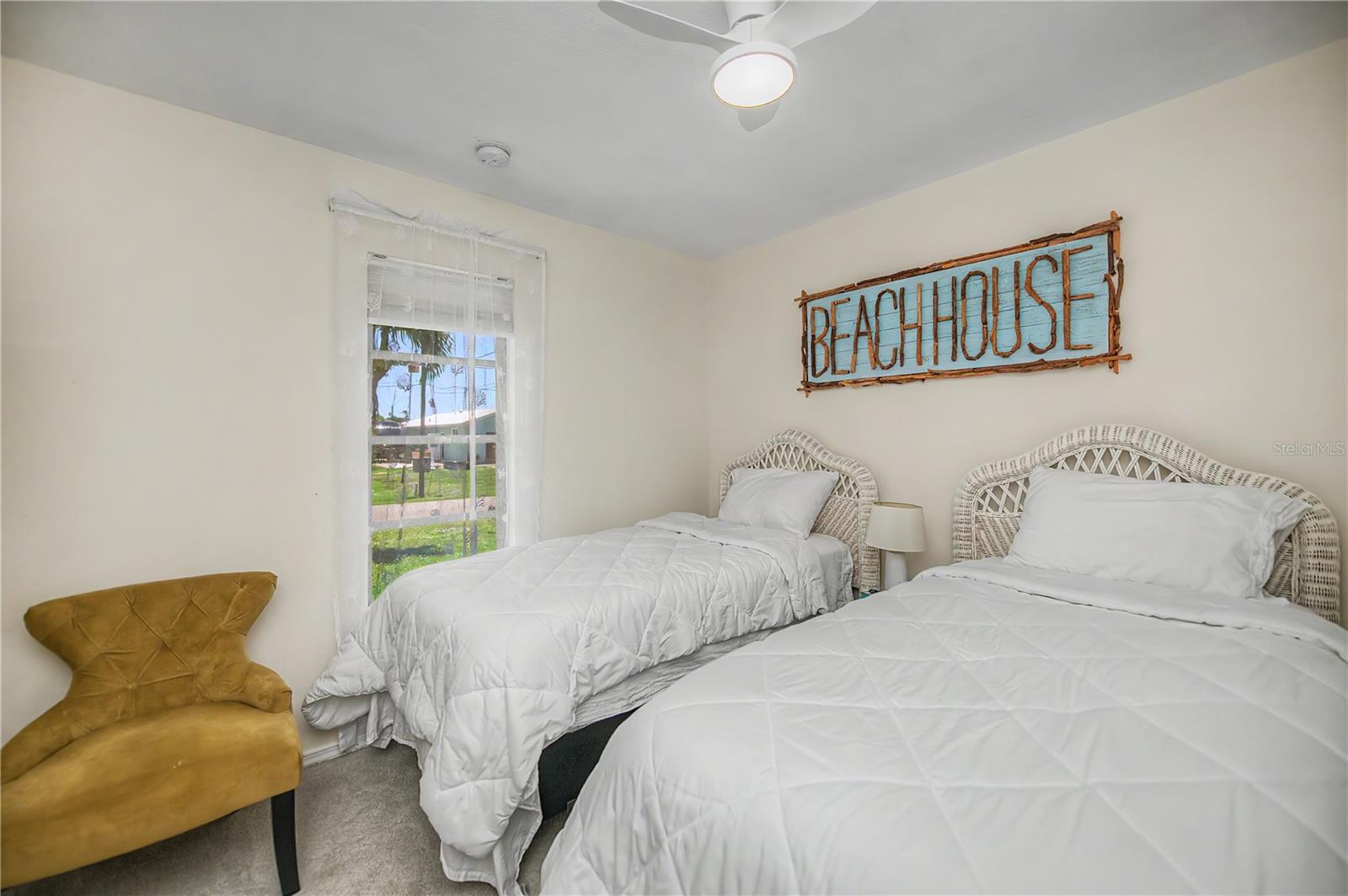 Coastal Inspired Guest Bedroom with Twin and Full Beds.
