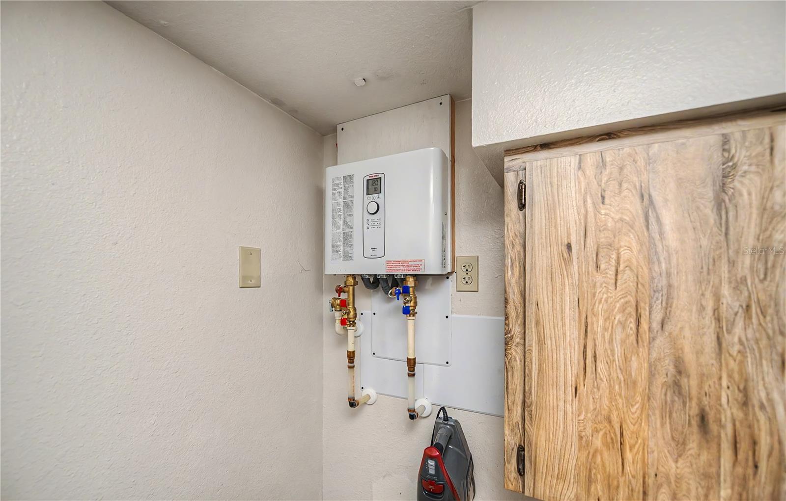 Tankless Water Heater Provides Energy-Efficient Hot Water On Demand.