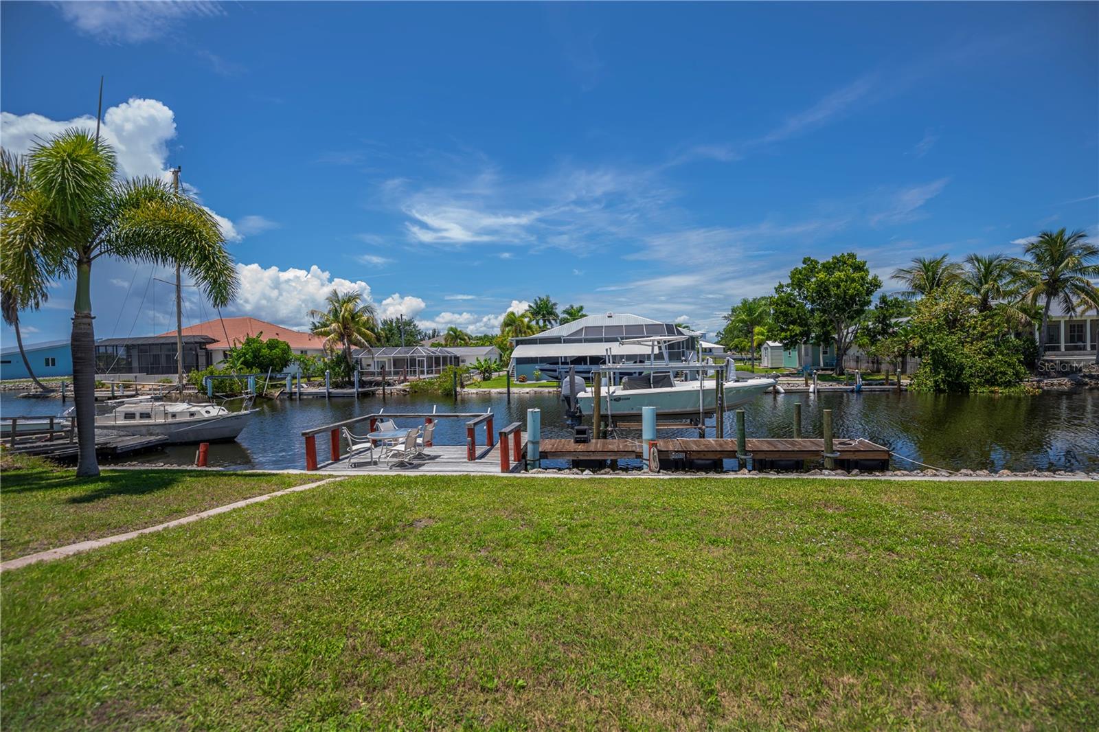 Generous Backyard Leading to Private Dock.