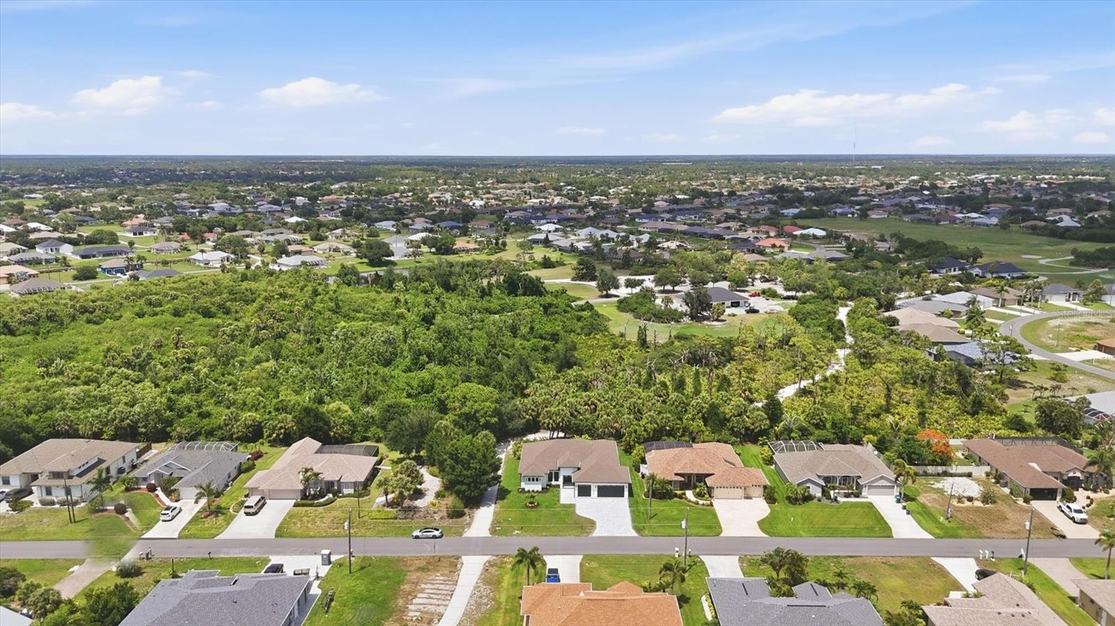 166 Medalist Rd, Rotonda West, FL 33947 — photo 4 of 56