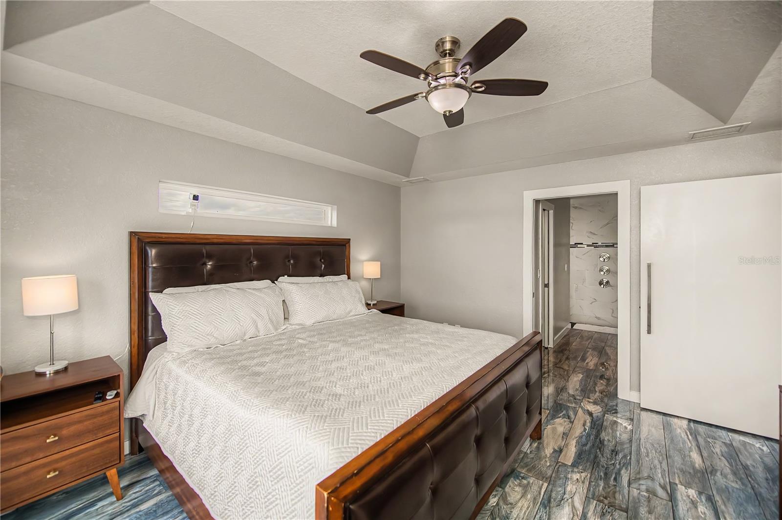 Peaceful Primary Suite Featuring a Tray Ceiling, Spa inspired Ensuite.
