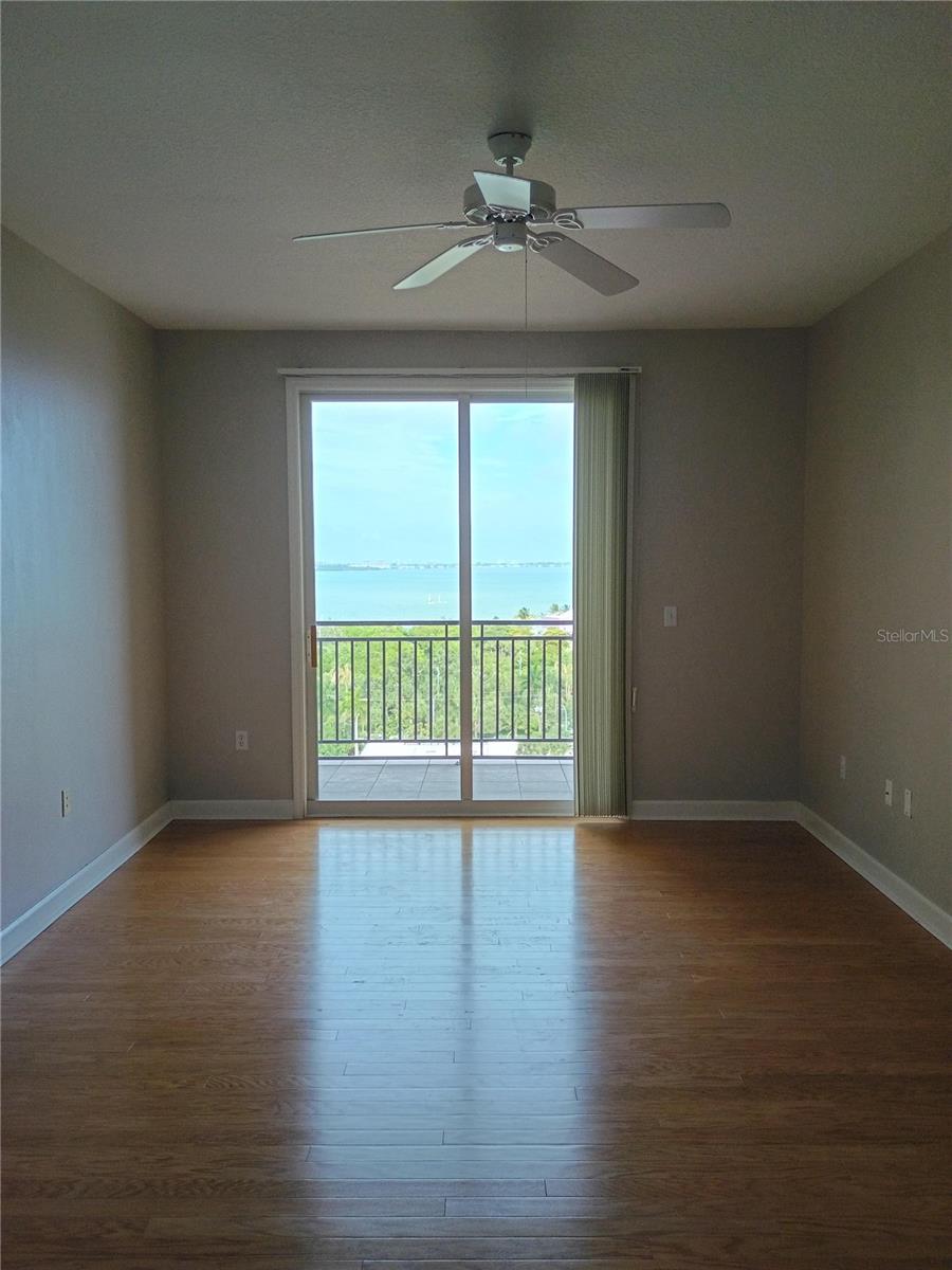Large, ensuite Bedroom, with sliding glass door to balcony