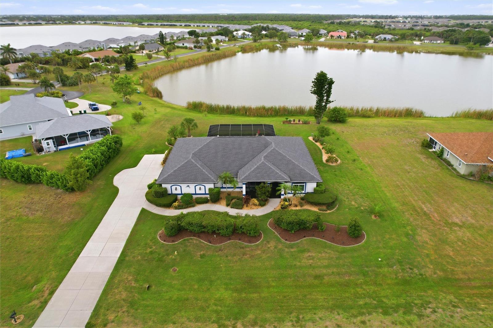 7100 San Casa Dr, Englewood, FL 34224 — photo 1 of 61