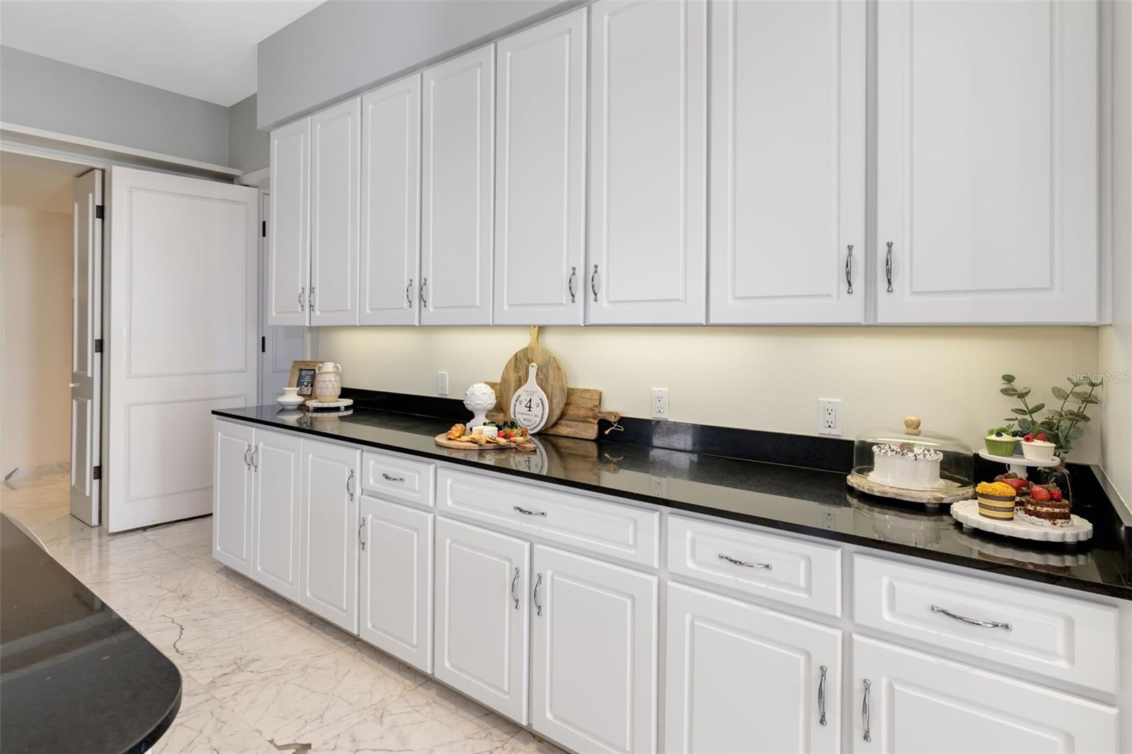 There is endless cabinet and counter space, pantry and a separate laundry room off of the kitchen