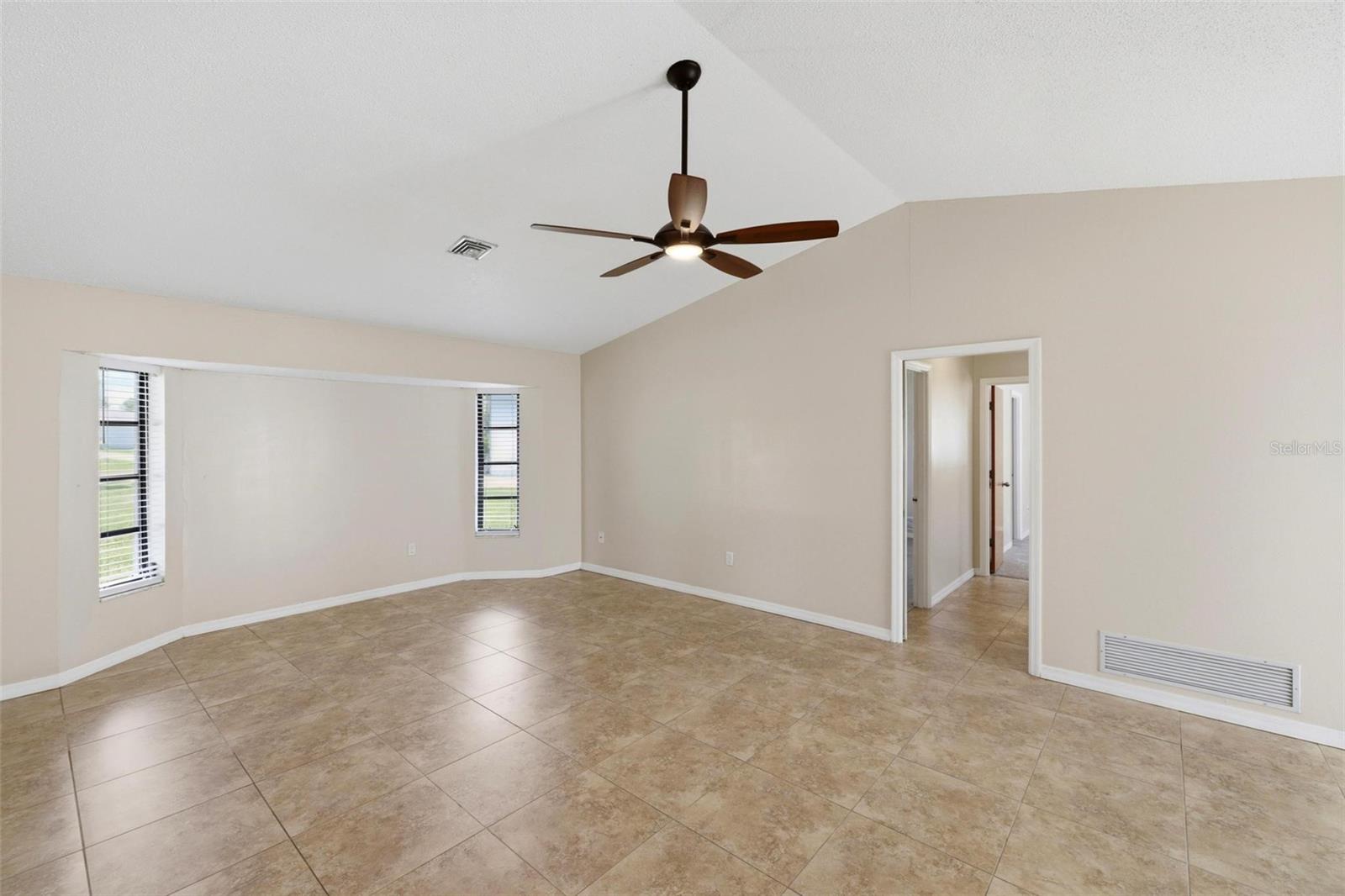 Family room with pocket door that leads to the two guest bedrooms....