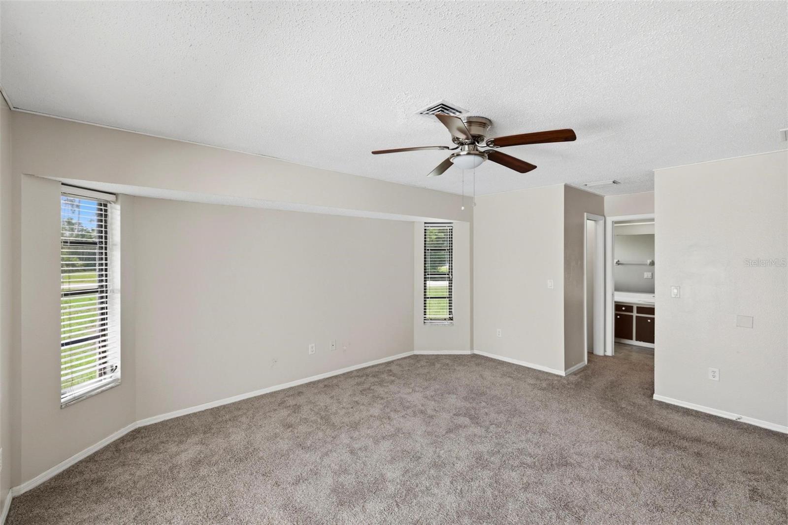 Primary Bedroom has two walk-in closets...