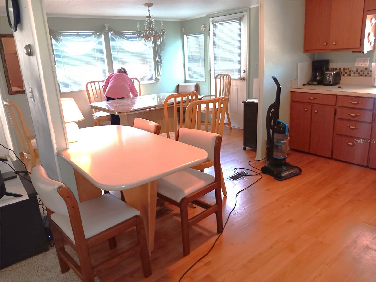 Kitchen area looking toward the dining room table.