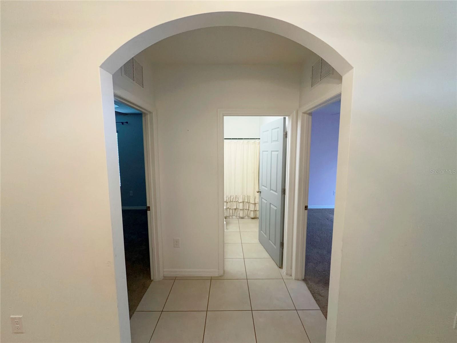 Hall to 2nd bath along with 3rd and 4th bedrooms