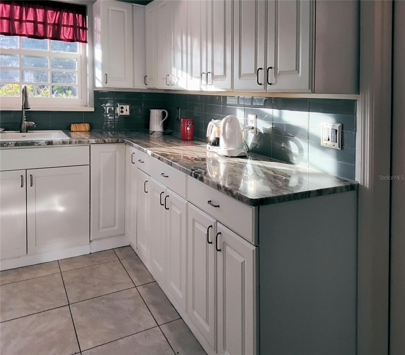 Kitchen cabinets and large sink