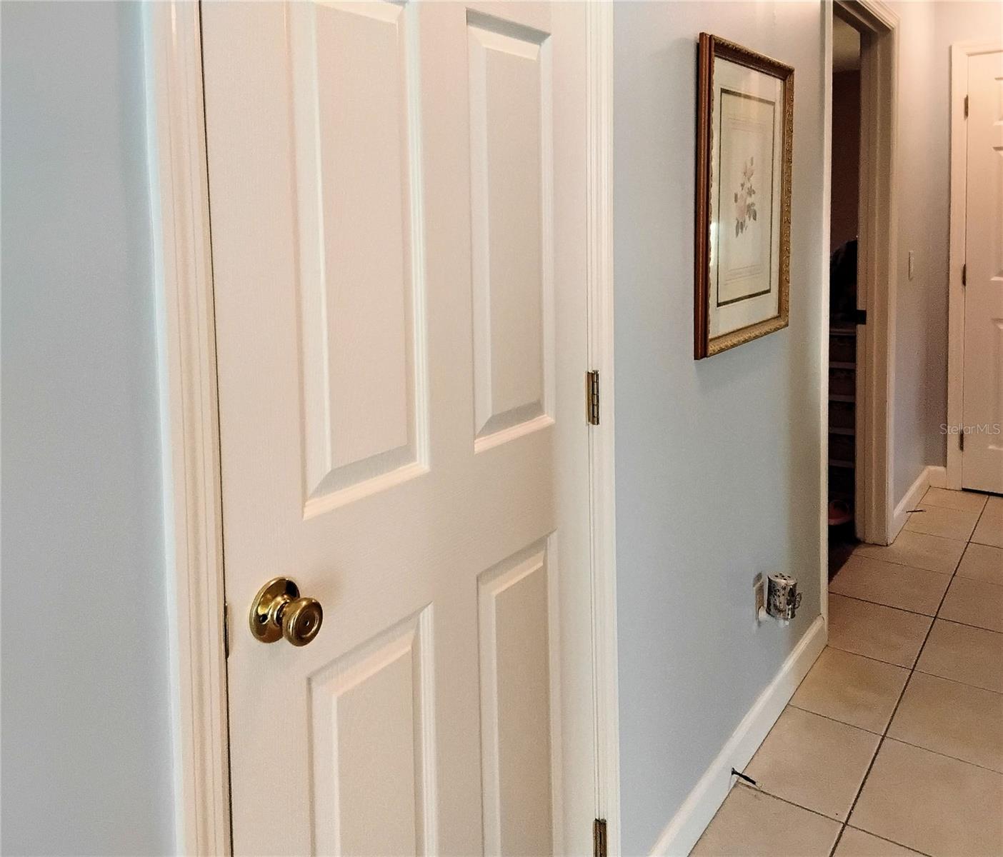 Left side of hallway leading to bedrooms