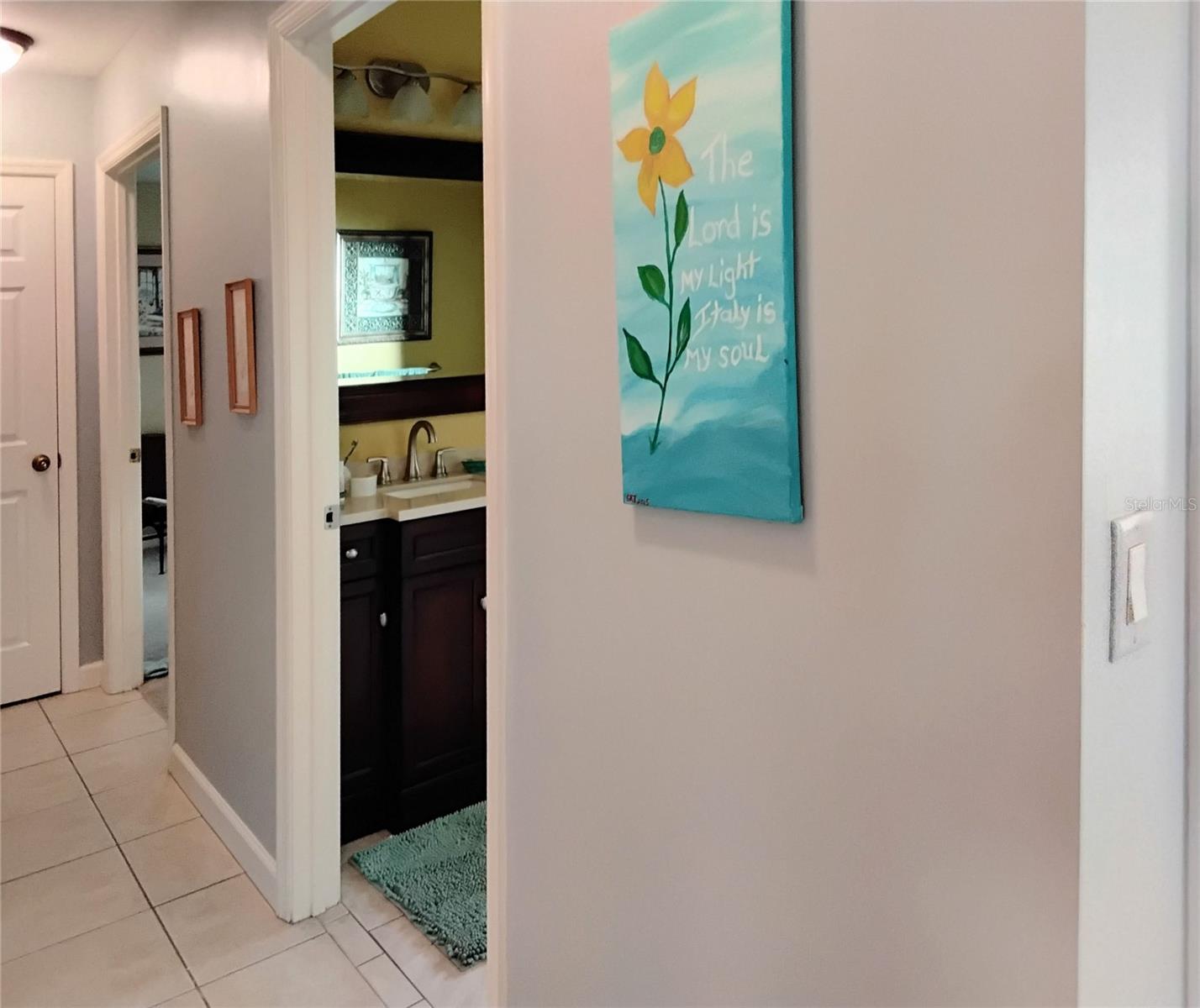 Right side of hallway leading to bedrooma