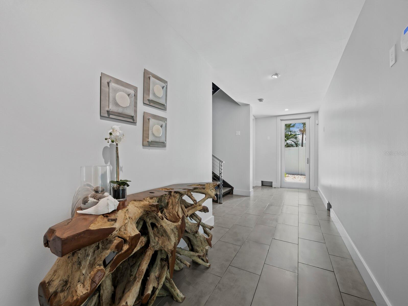 Foyer entry and elevator to all floors