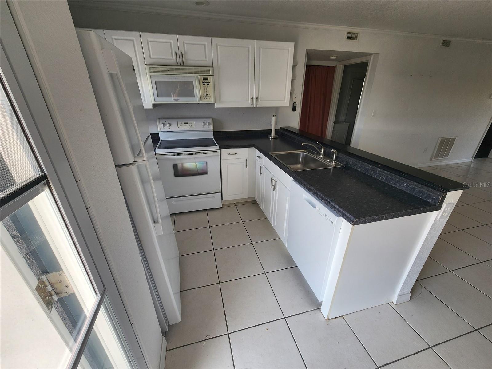 25050 Sandhill Blvd #B1, Punta Gorda, FL 33983 — photo 4 of 21