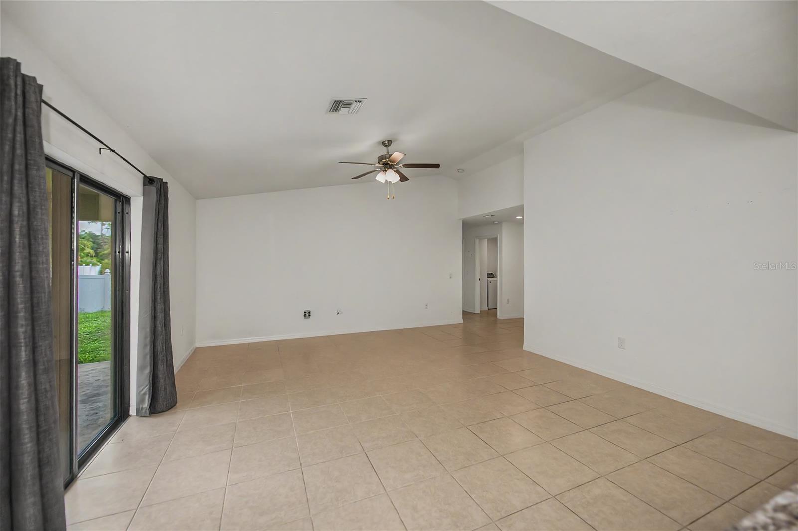 Bright Living Room with Direct Access to Patio