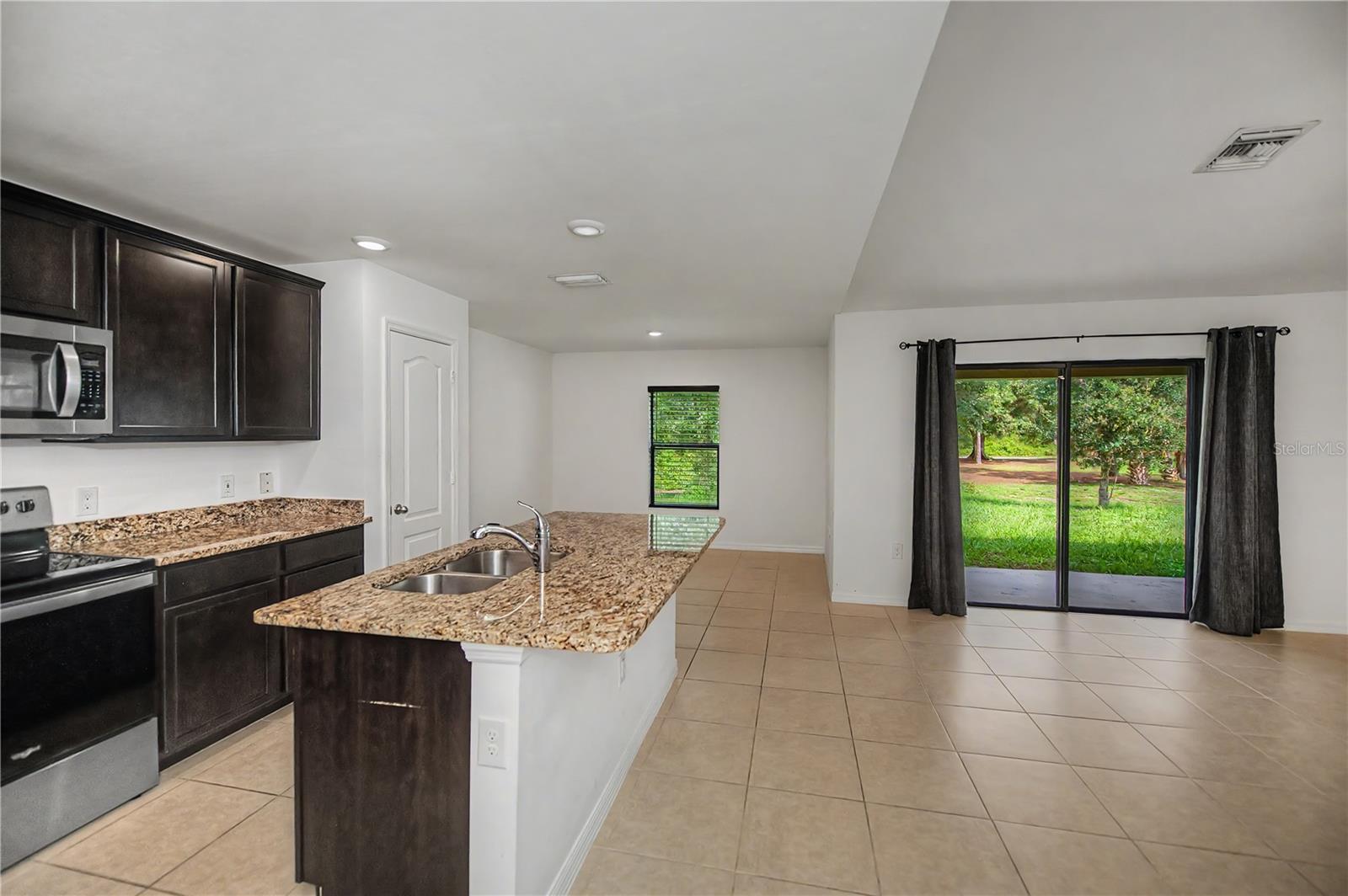 Open Concept Kitchen, Dining and Living Area