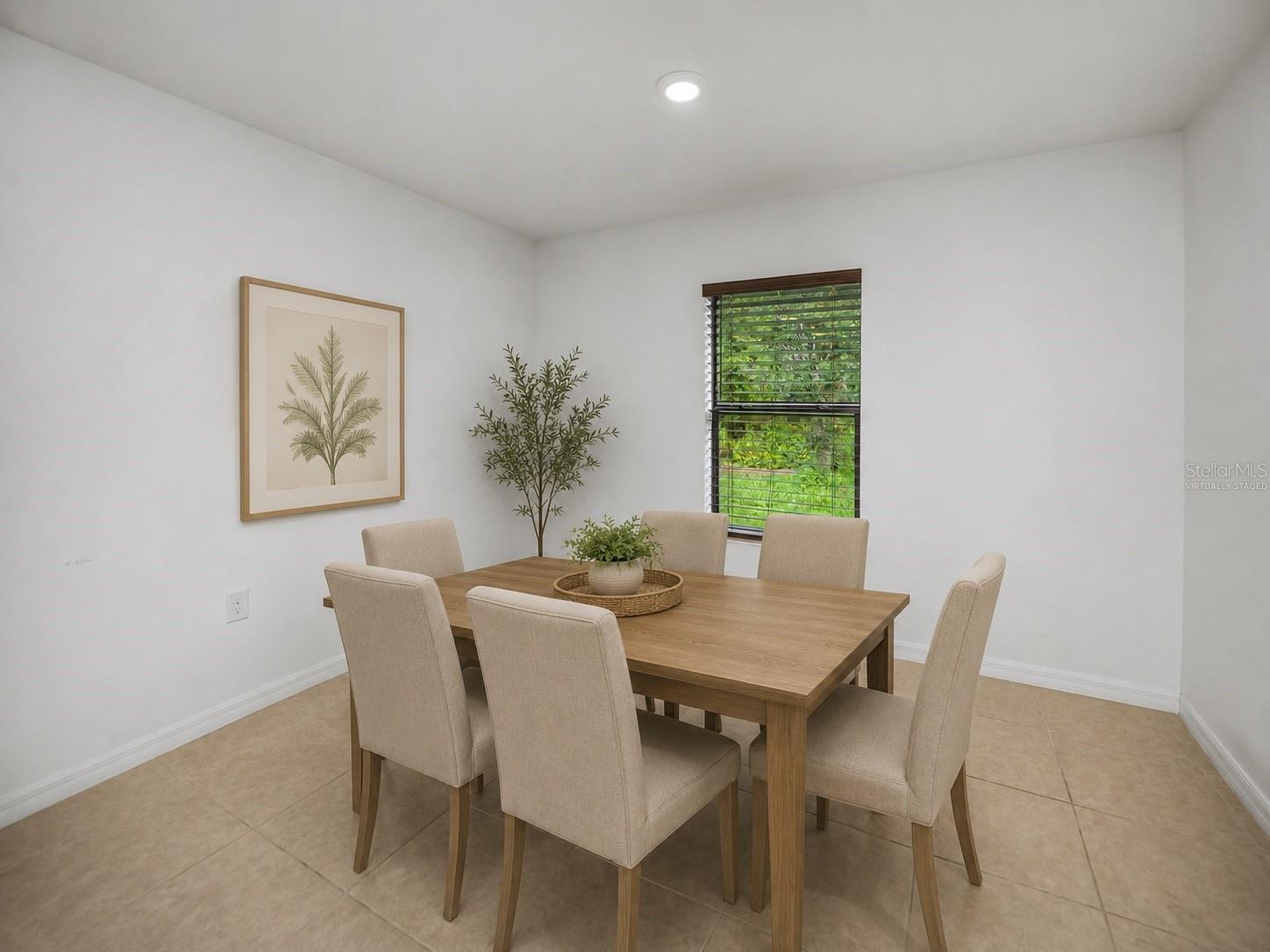 Virtually Staged Dining Area with Bright Natural Light