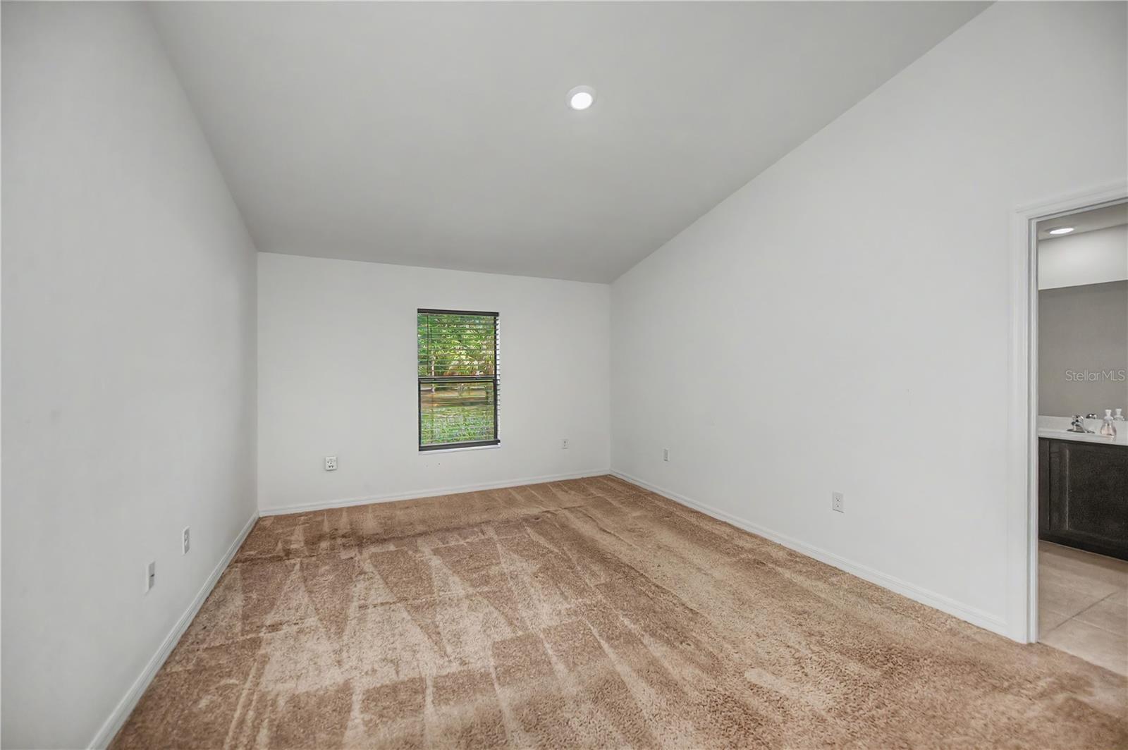 Spacious Primary Bedroom with Clean Finishes and Ensuite Access