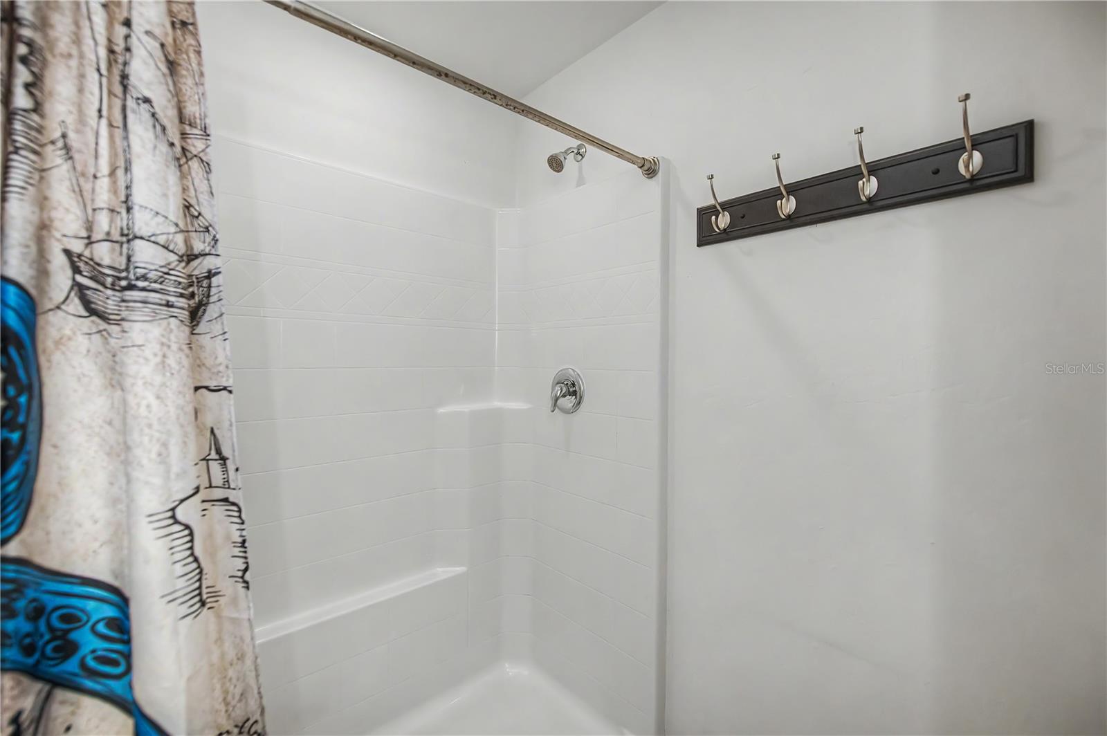 Primary Bathroom Features Tub/Shower Combo