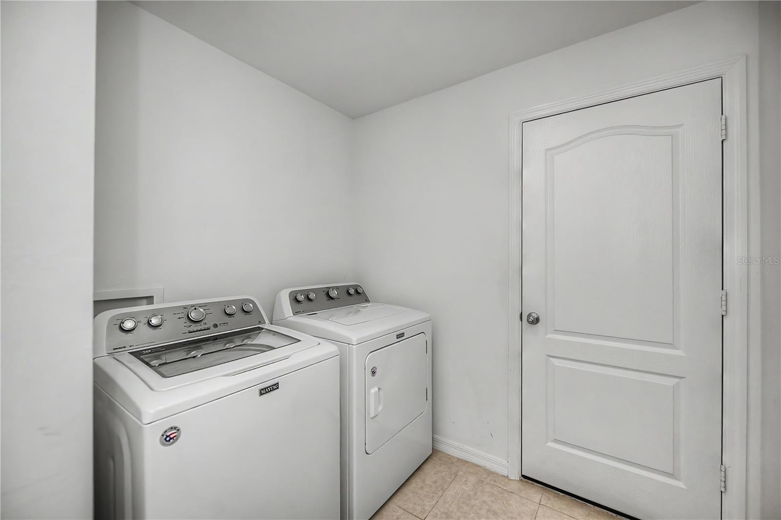 Inside Laundry Room with Washer & Dryer Included