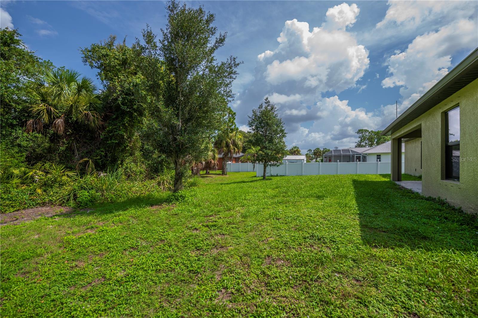 Generous Size Backyard With Mature Landscaping