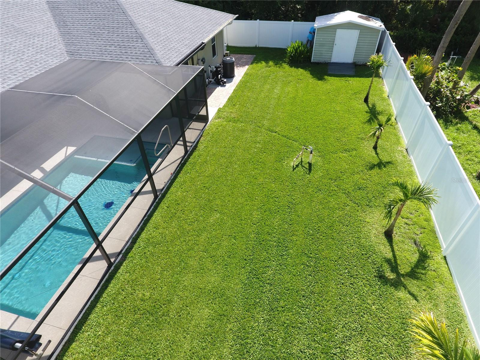 Backyard fenced with shed