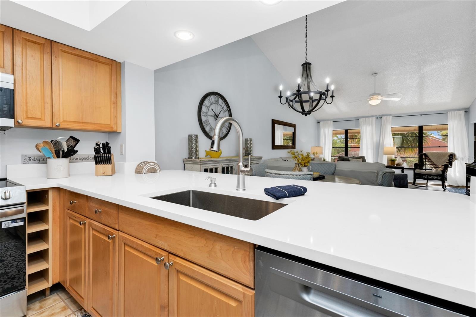 Kitchen opens up to dining and living room.