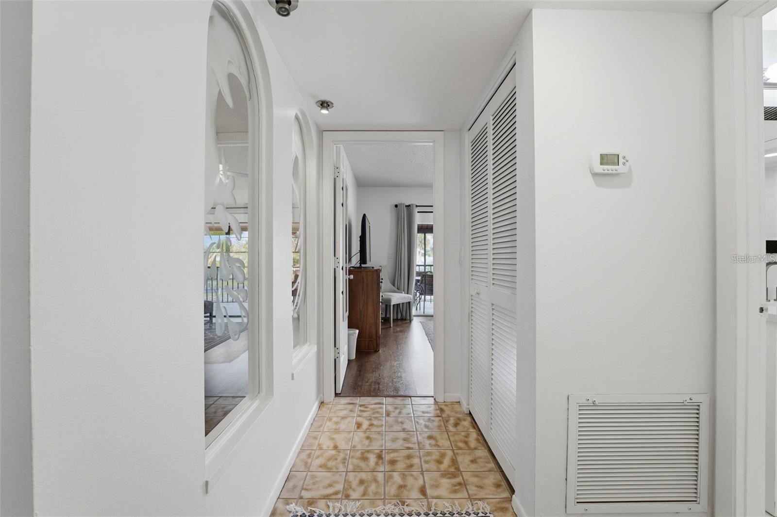 Hallway to primary bedroom