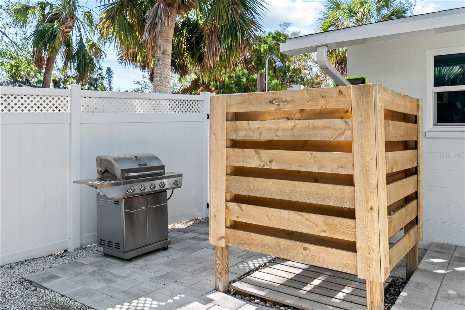 Outdoor shower and grill area