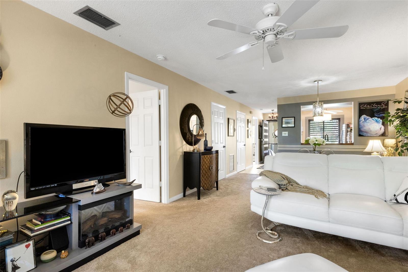 Electric fireplace in console for extra ambiance.