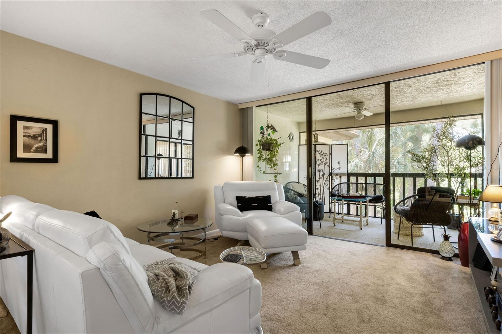 Sliding glass doors bringing the outdoors in.