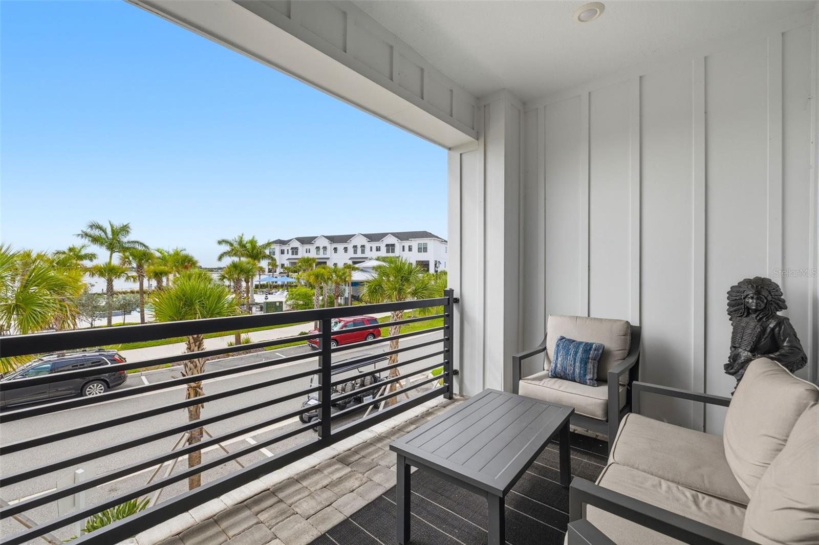 Balcony with water views off second floor