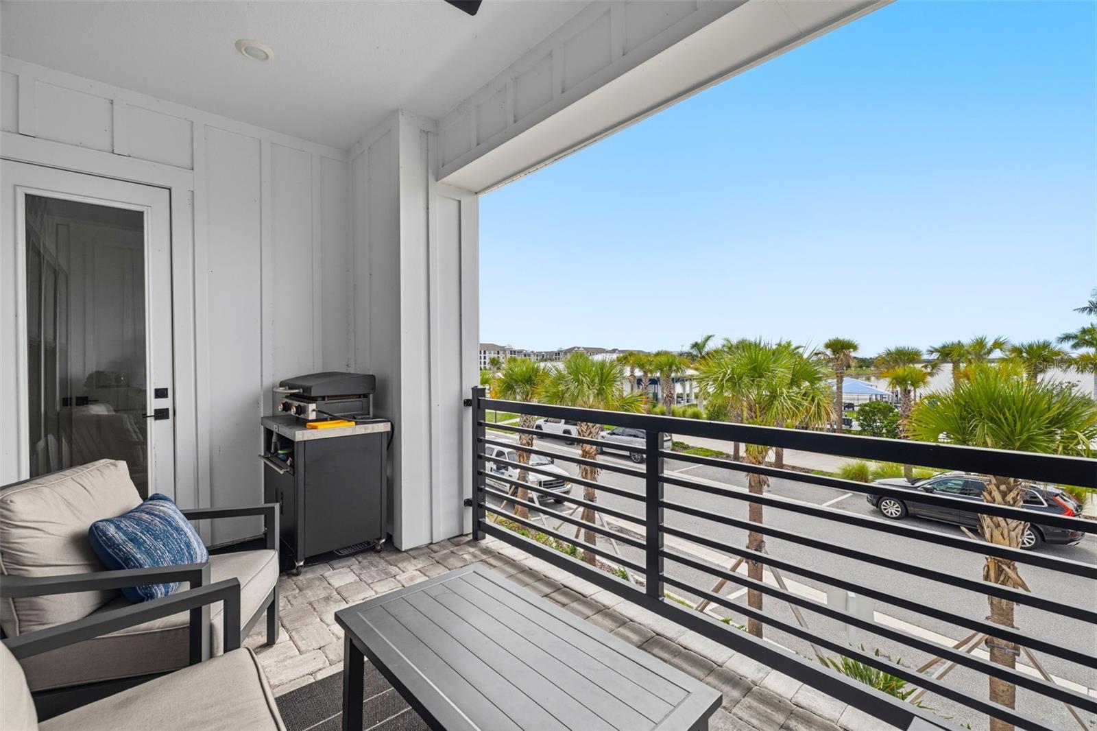 Balcony with water views off second floor