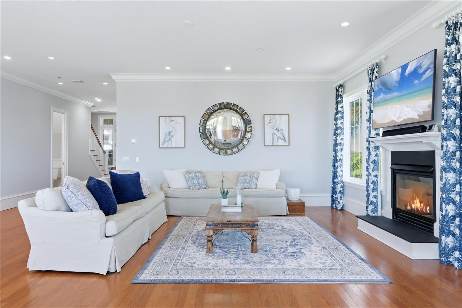 Multiple sitting areas including fireside