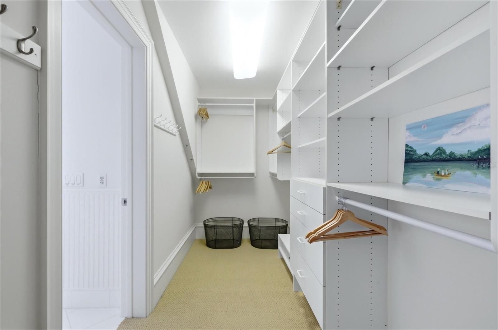 Primary closet with custom built-ins