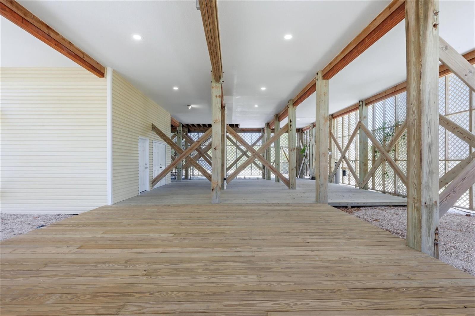 With golf cart garage and storage area