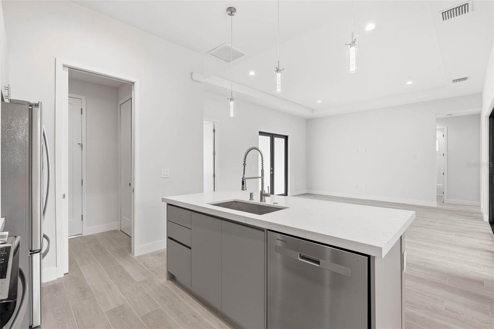 Kitchen Features Breakfast Bar and Stainless Appliances