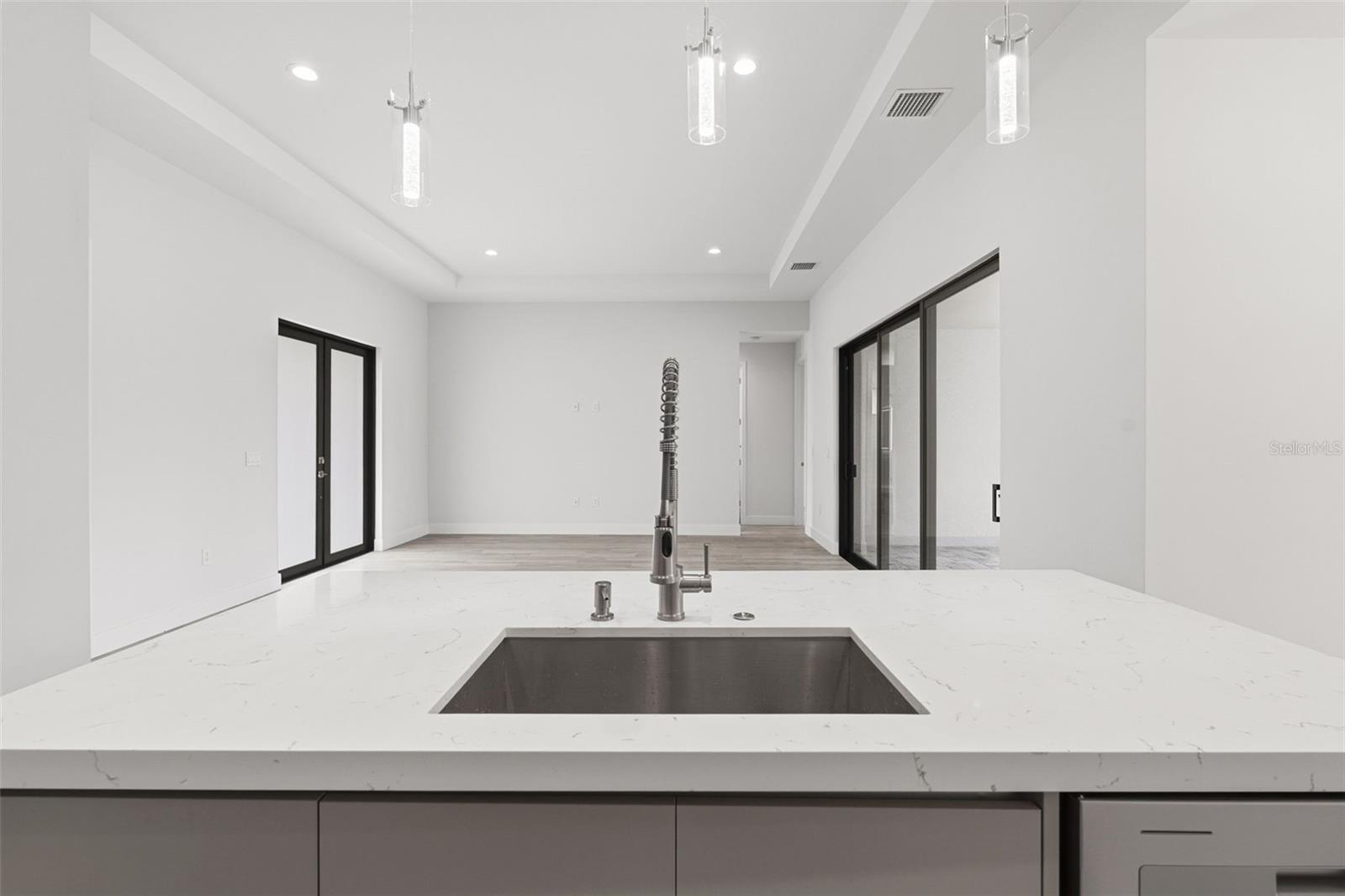 Kitchen Features Breakfast Bar and Stainless Appliances