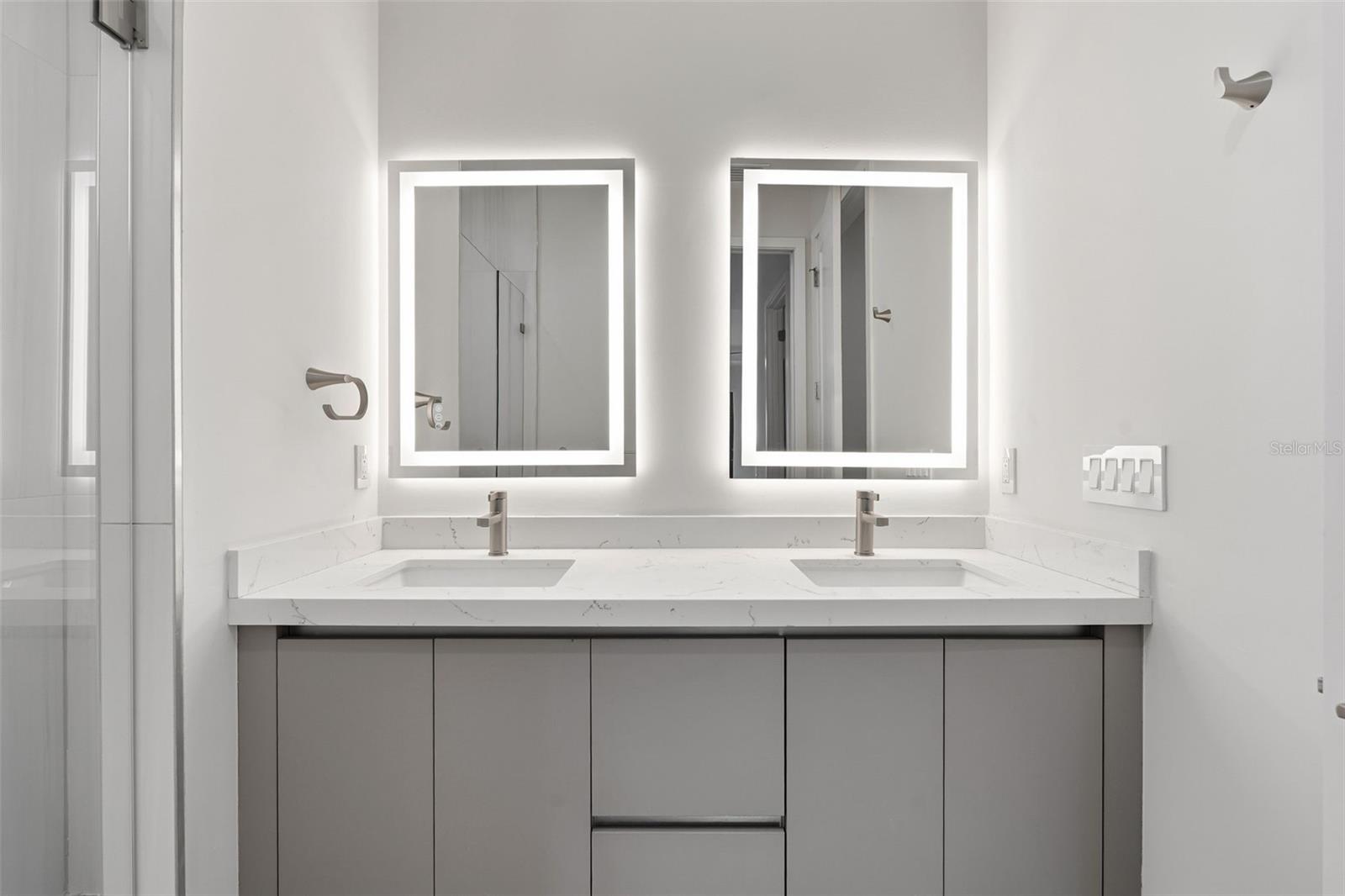 Primary Bathroom with Dual Vanity, LED Mirrors and Walk-In Glass Shower