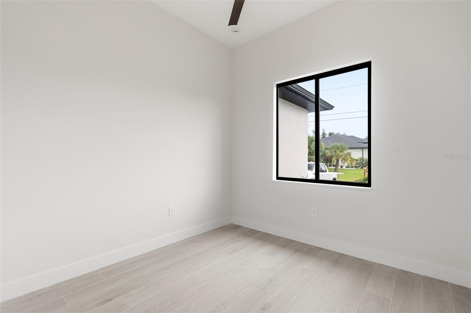 Bedroom 2 Features Natural Light and Modern Finishes