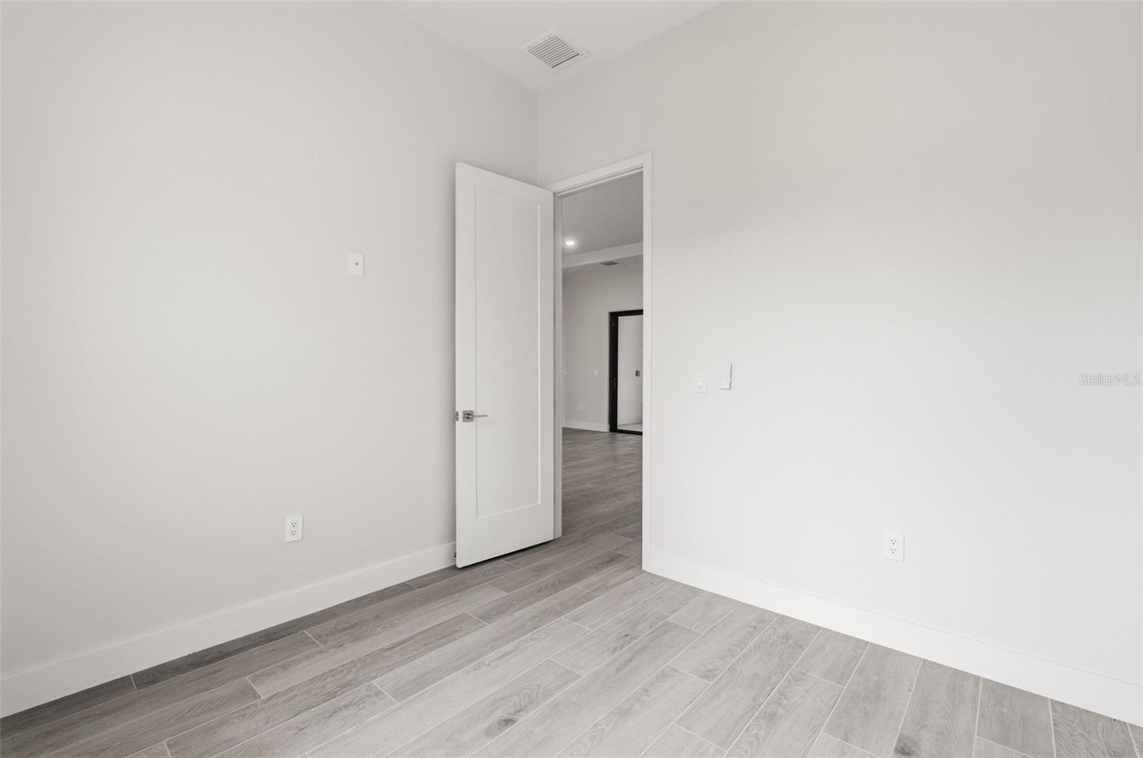 Bedroom 2 Features Natural Light and Modern Finishes