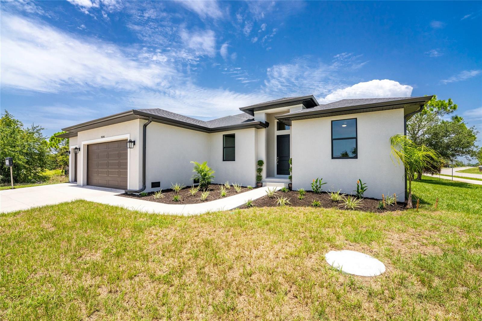 9590 Honeymoon Dr, Port Charlotte, FL 33981 — photo 2 of 50