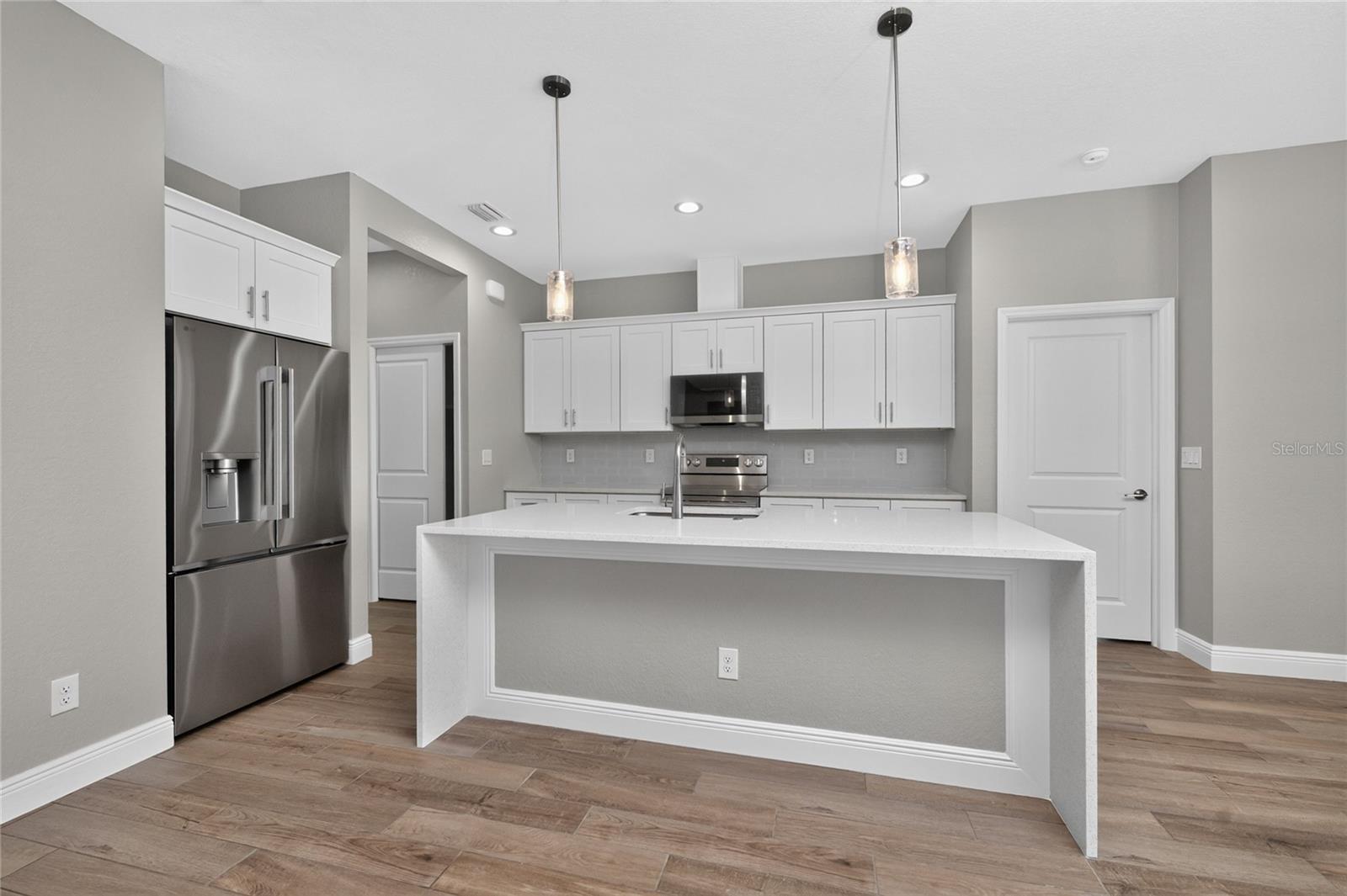 9590 Honeymoon Dr, Port Charlotte, FL 33981 — photo 12 of 50