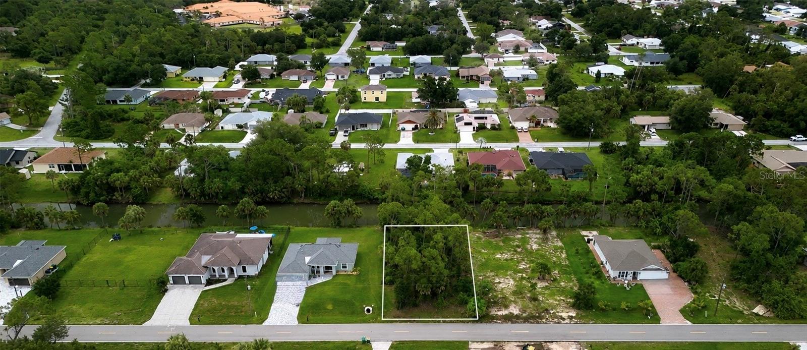 Front view of this freshwater front lot