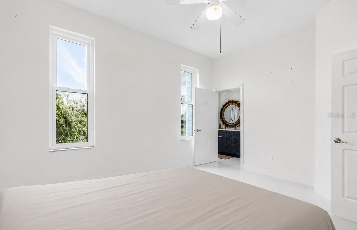 First-floor bedroom and bathroom overlooking the canal