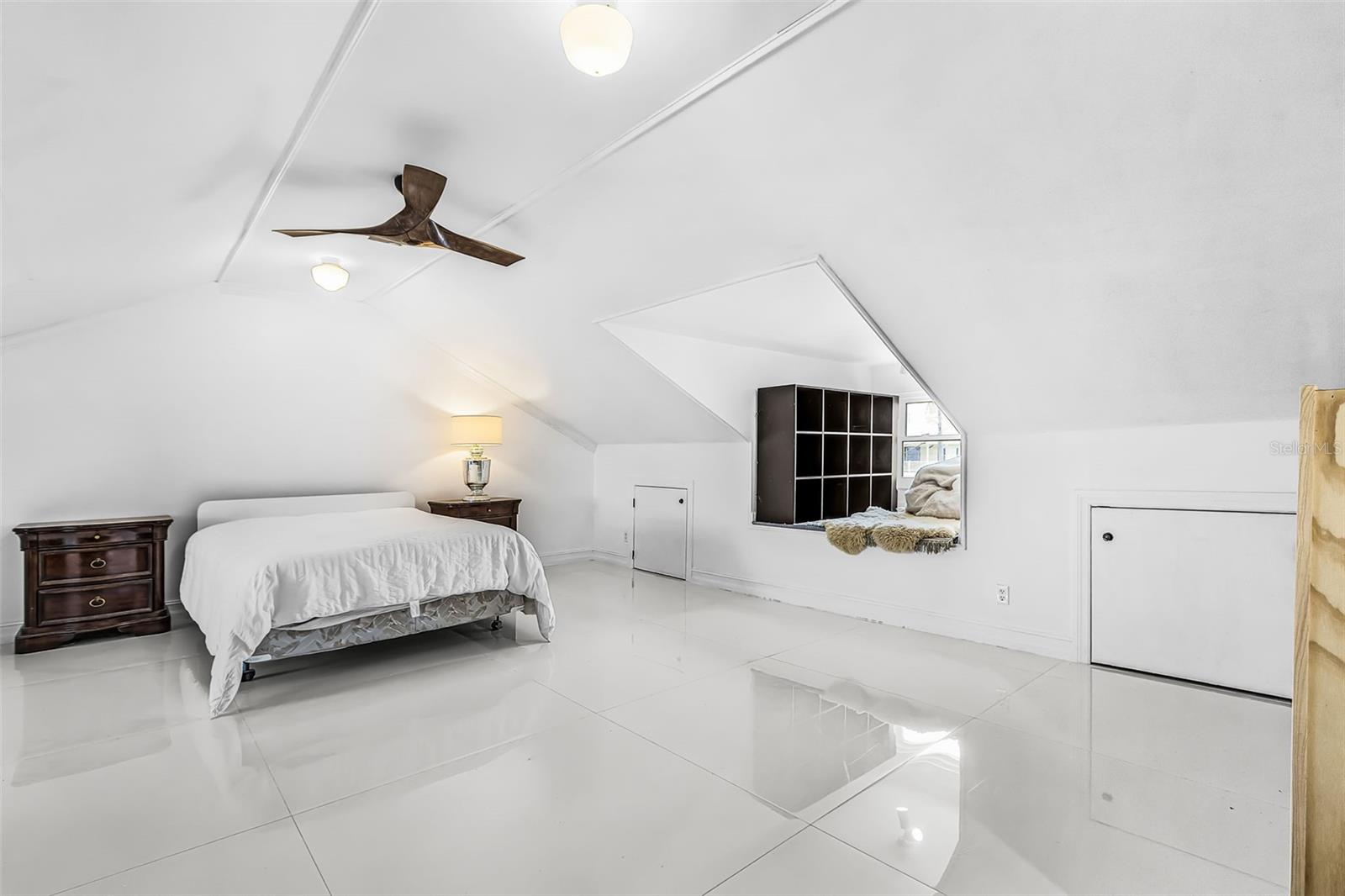 Second-floor bedroom with street view