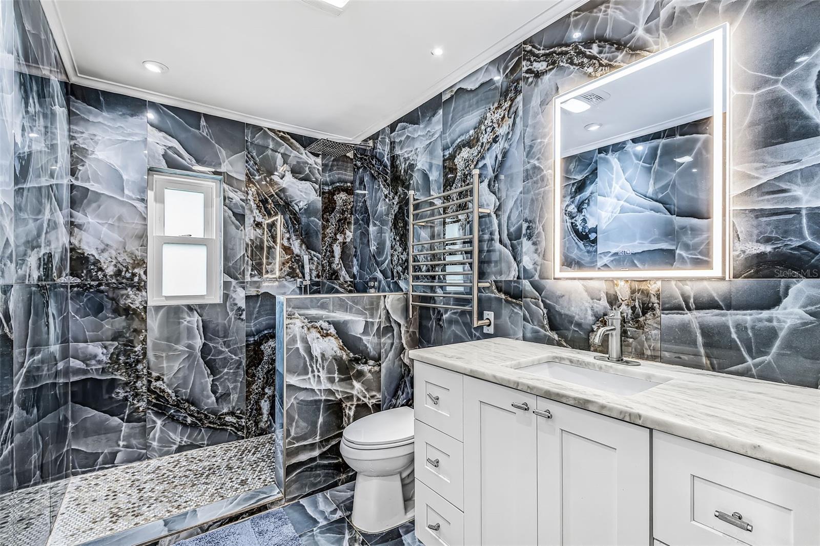 Sencond-floor bathroom overlooking the canal