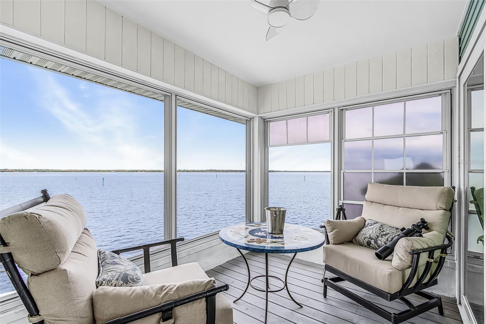 Second-floor balcony overlooking the river