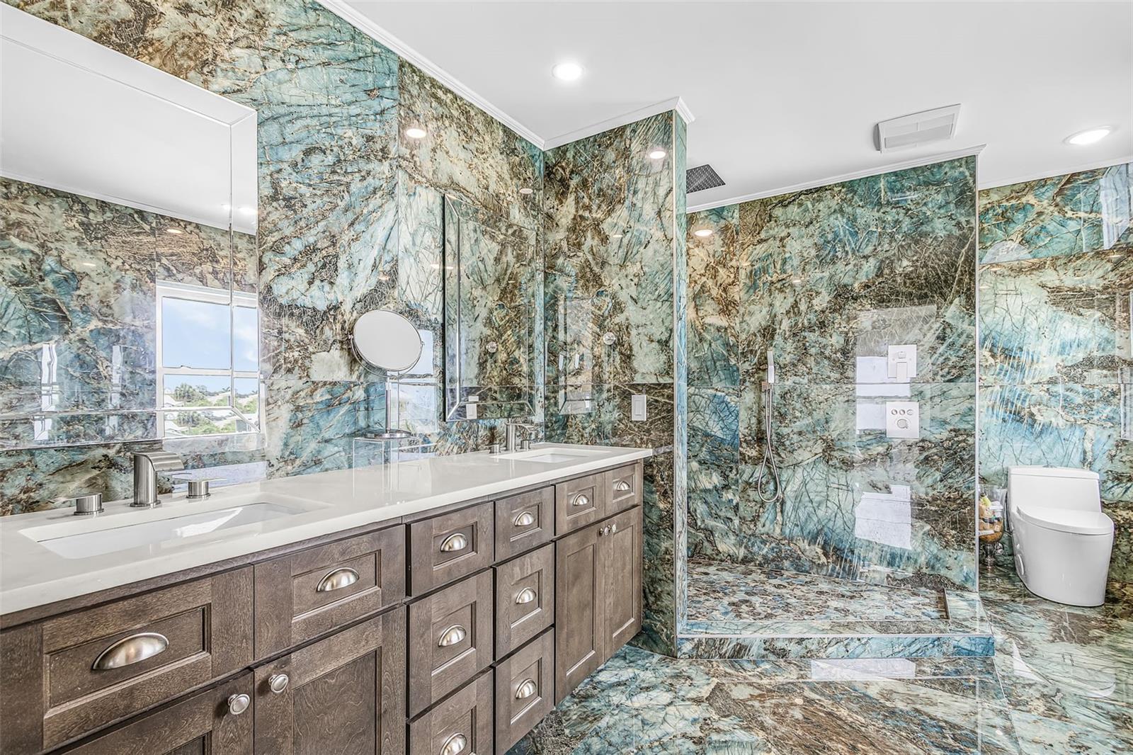 Second-floor primary bathroom with walk-in shower.