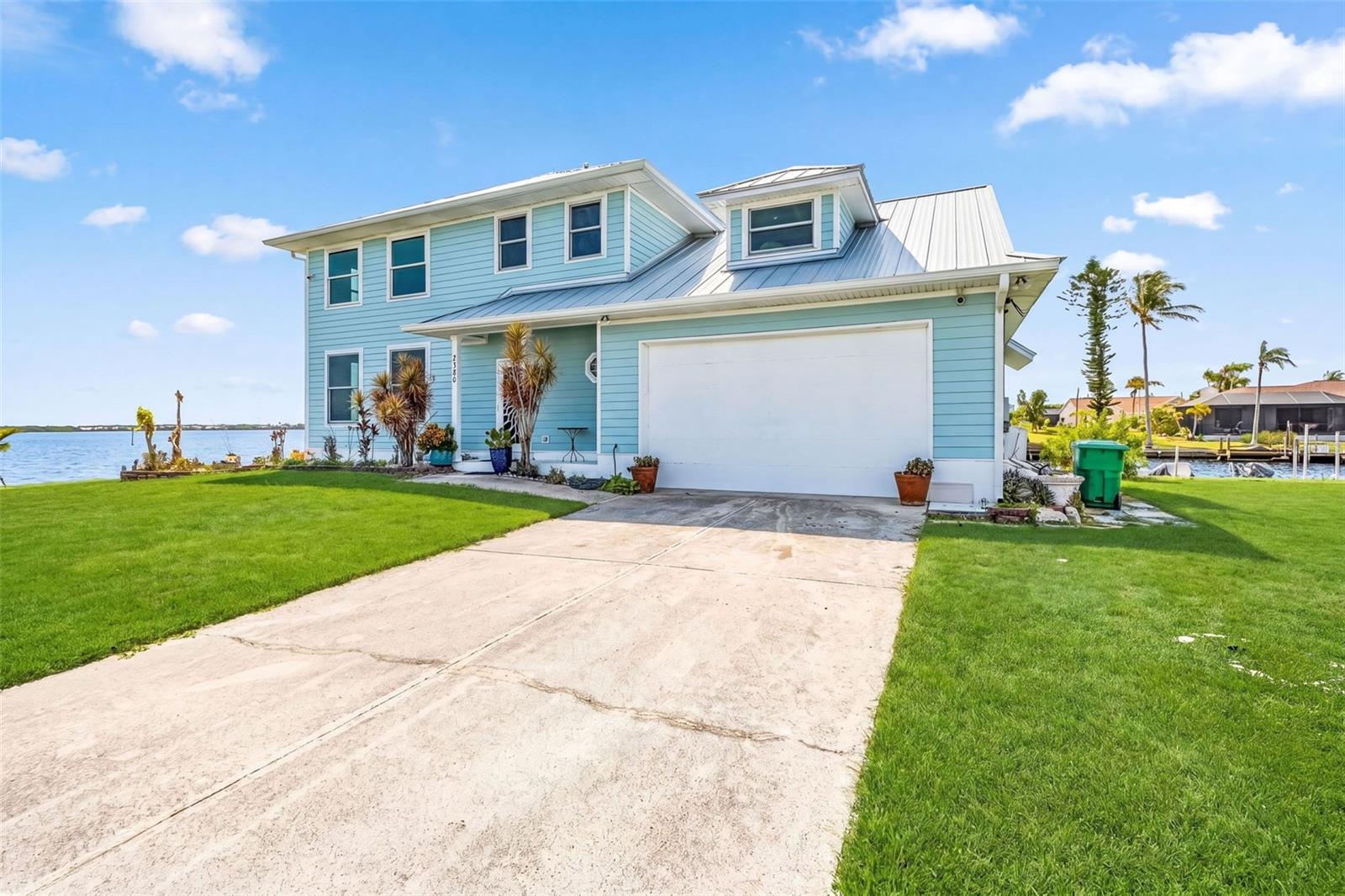 Front exterior of the home featuring the driveway